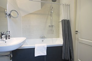 Deluxe Zimmer - Badezimmer