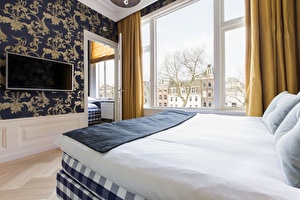 Deluxe Kamer kanaalzicht 3 personen