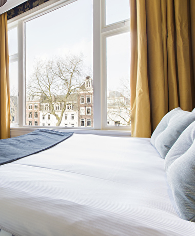 a room with canal view in amsterdam